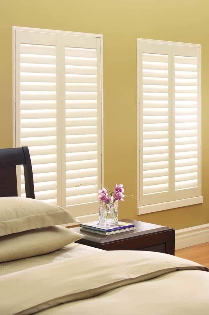 Transforming Your Living Room Windows Near Gresham & Portland, Oregon (OR) including Hunter Douglas shutters and drapes.