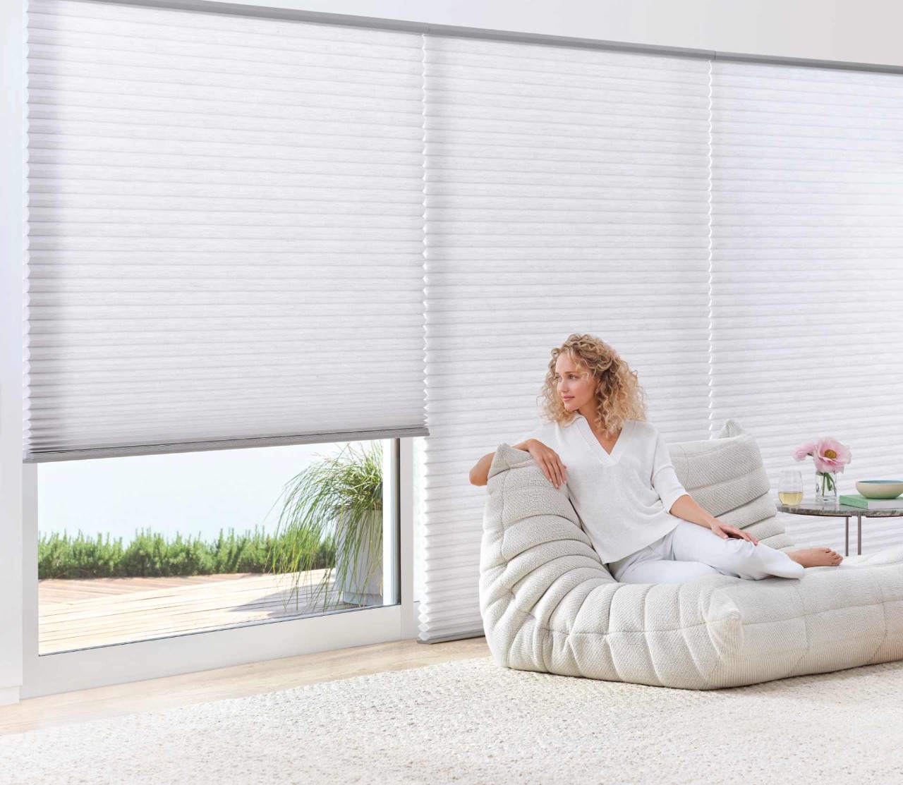 Hunter Douglas Pirouette® Sheer Shades illuminating in a bright window near Gresham, Oregon (OR)