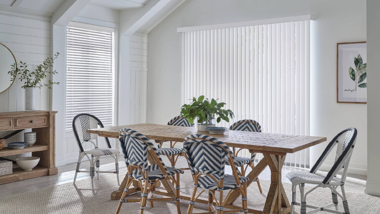  Hunter Douglas Vertical Solutions® Vertical Blinds in a dining room near Gresham & Portland, OR